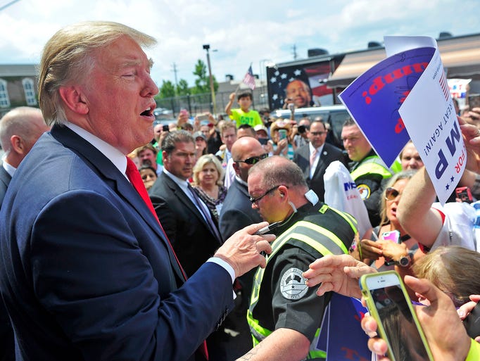 Trump draws cheers, criticism during Nashville visit