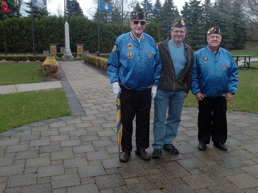 From left, veterans Joe Bishop, Bear Hall and Ron Nevorski