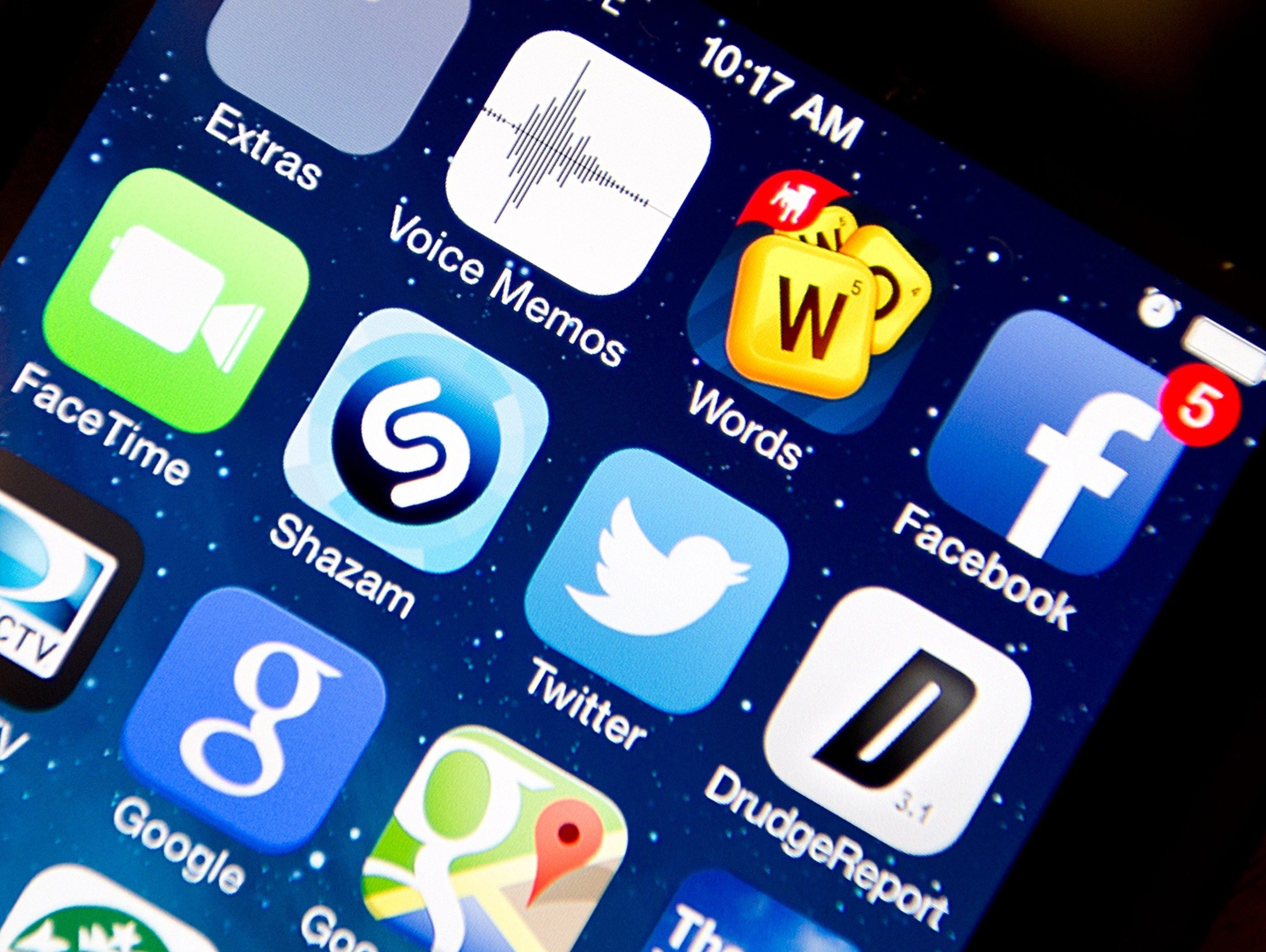 A view of apps on an iPhone 5S smartphone.