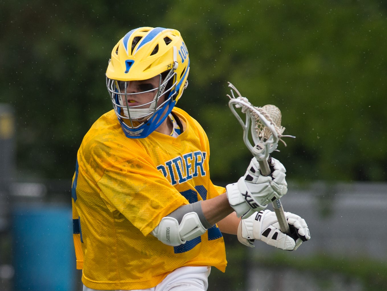 Caesar Rodney's Jacob Pangle (22) runs with the ball in their home game against Tower Hill.