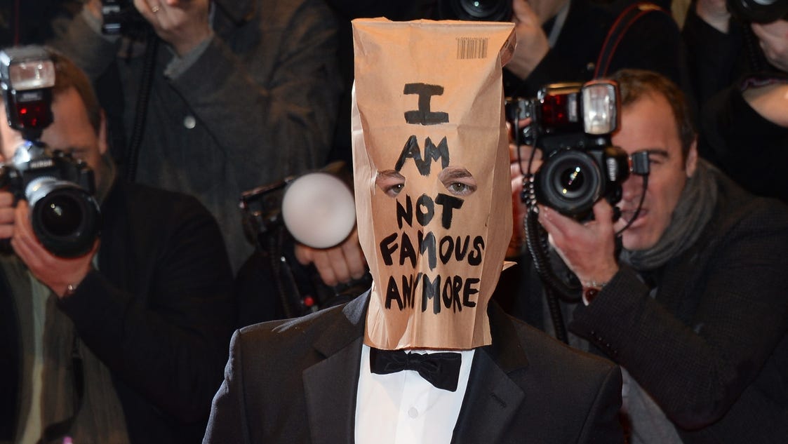 Shia LaBeouf sports paper bag on head at film premiere