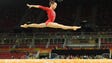Yilin Fan of China performs on the balance beam during