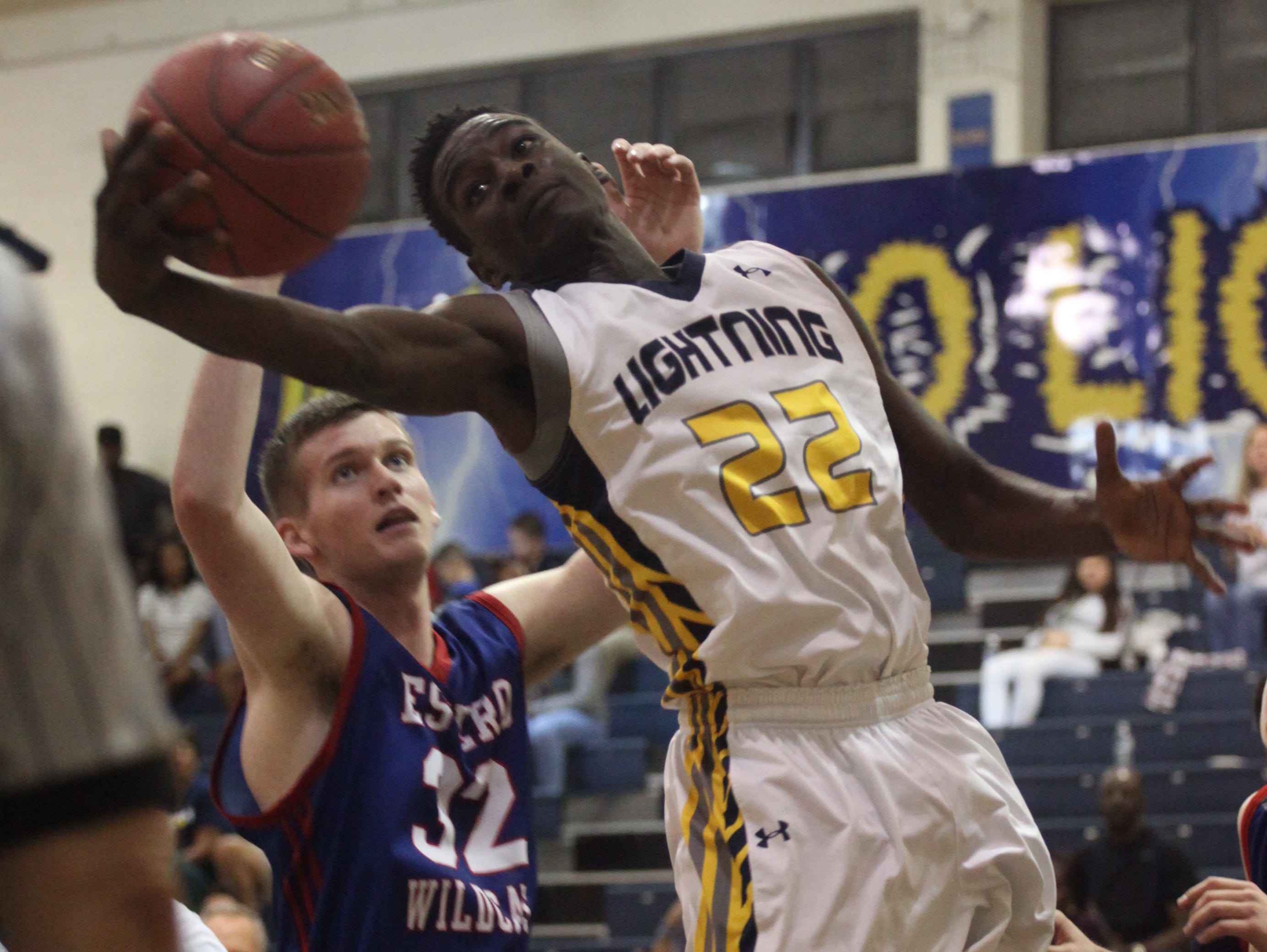 Lehigh’s Shyheem Jacques-Louis snatches the rebound during a game against Estero on Wednesday.