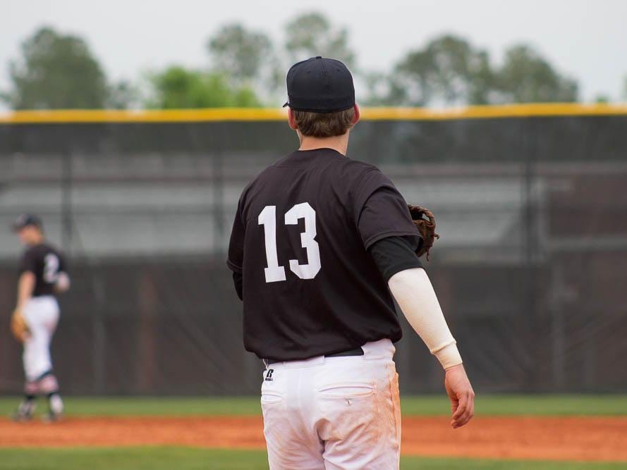 Tate’s Logan Blackmon and the rest of the infield warm up in between innings of Wednesday’s game vs. Pace.