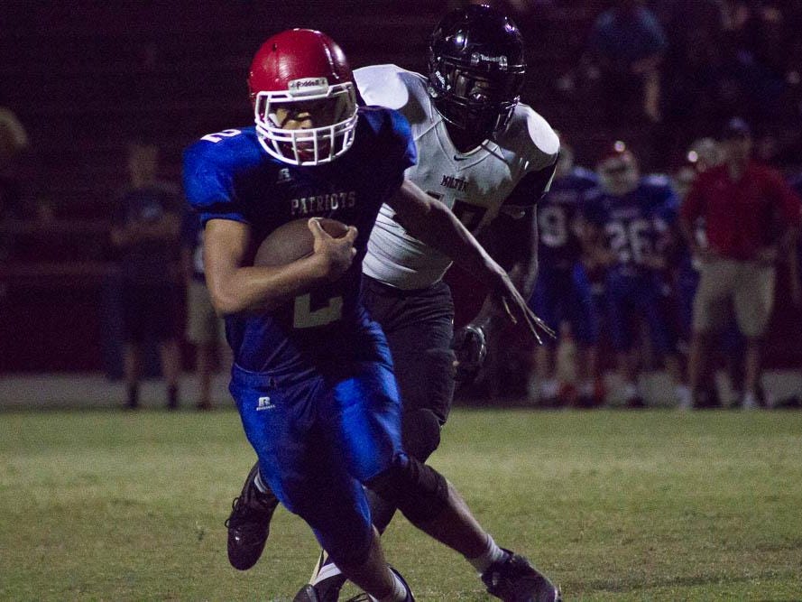 Pace’s Damean Bivins breaks free in the open field during action Monday night at Patriot Stadium.