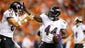 Baltimore Ravens fullback Vonta Leach (44) celebrates with tight end Dallas Clark (87) after scoring a touchdown during the first quarter against the Denver Broncos at Sports Authority Field at Mile High.
