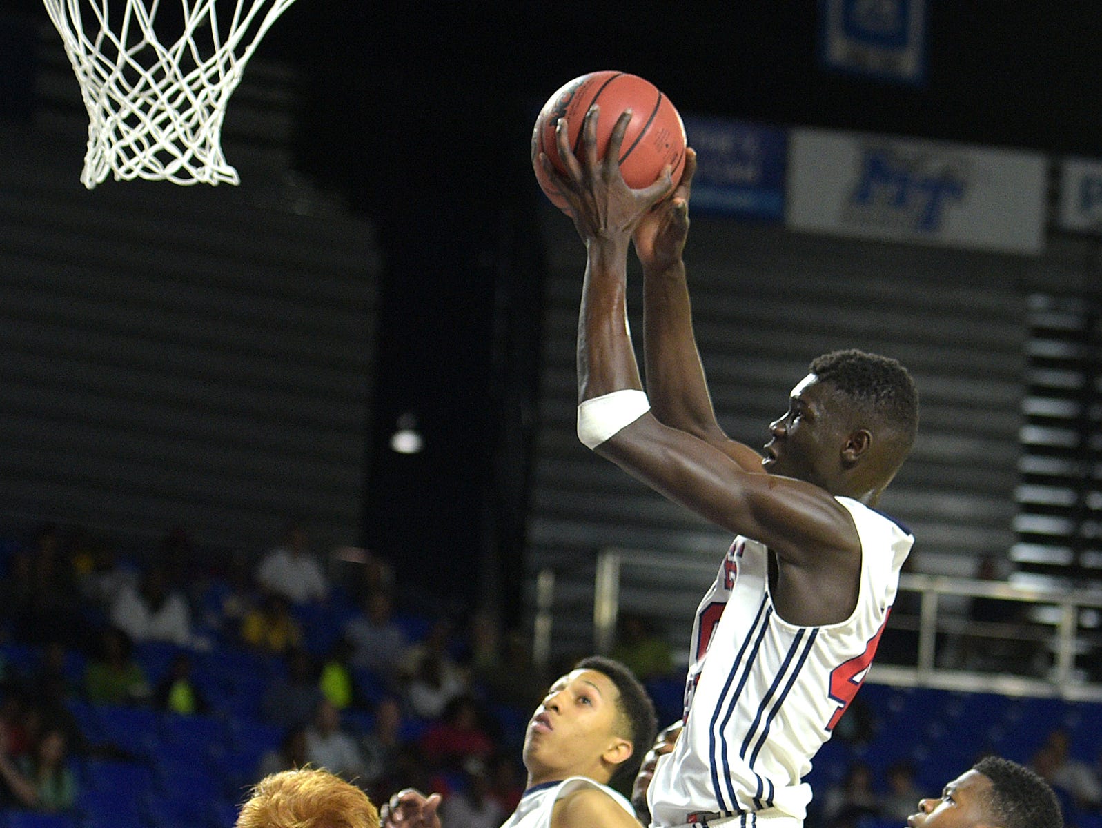 Whites Creek's Ruot Monyyong (40) shoots a jumper and scores against Westview during a Class AA state quarterfinals game at MTSU's Murphy Center on Thursday March 17, 2016.