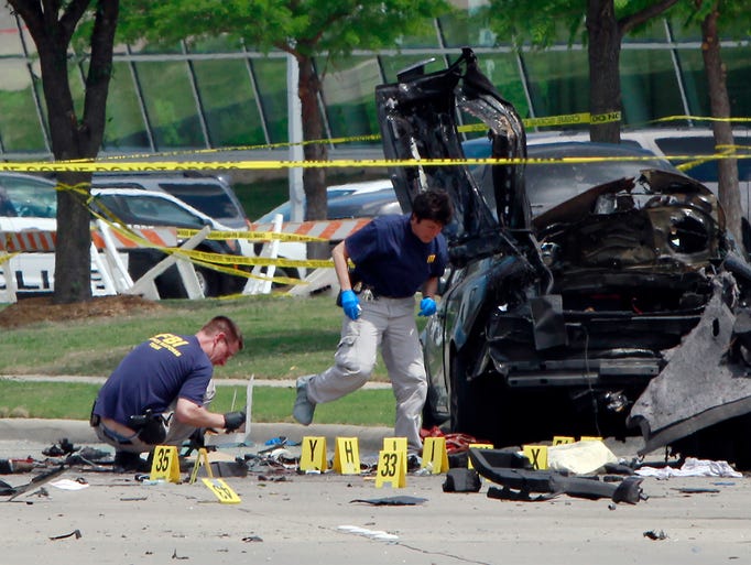 Traffic cop killed both attackers at Mohammed exhibit in Texas