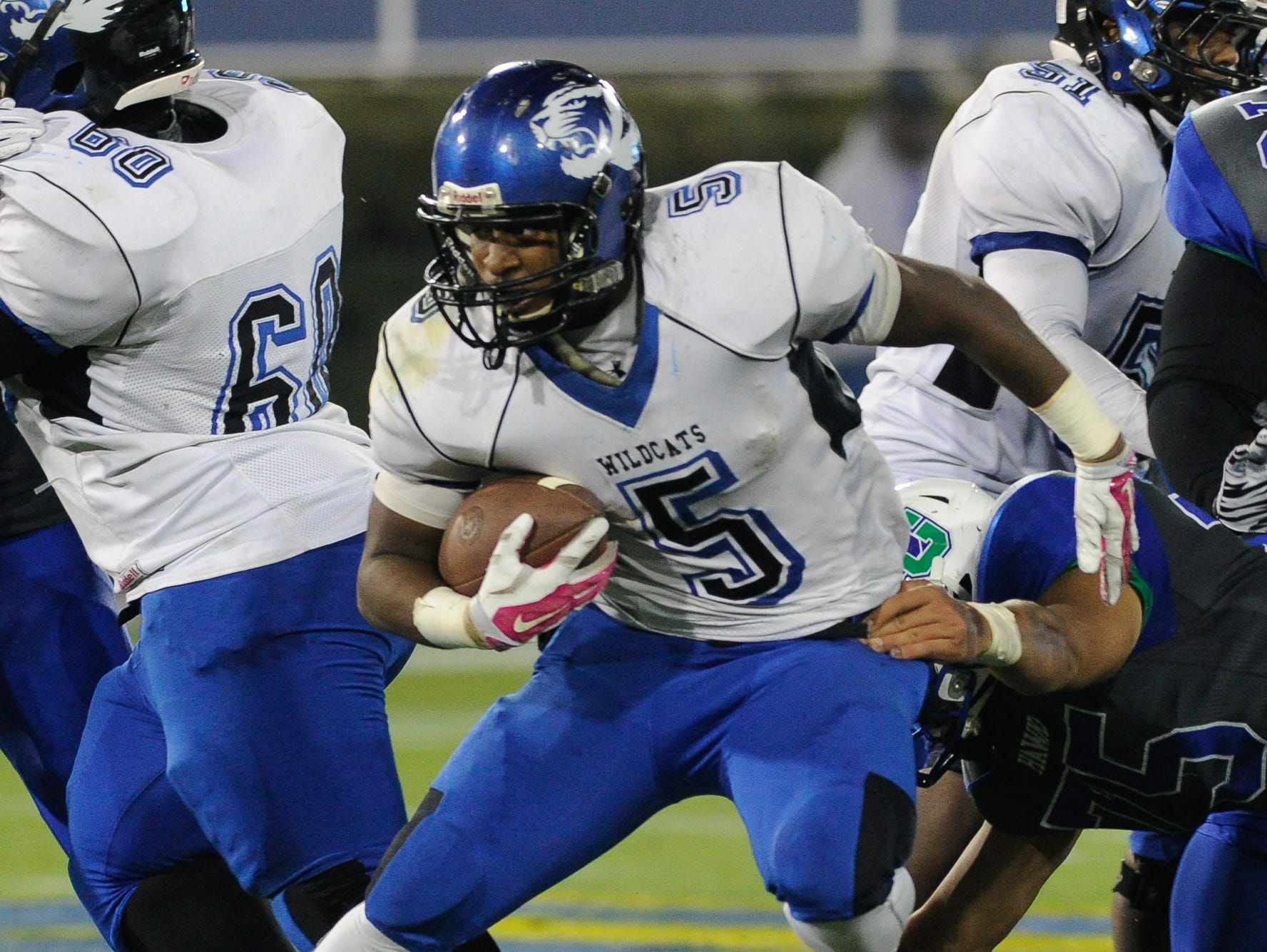 Howard's #5 Gerald Wiggins runs the ball during the Division II championship against St. Georges.