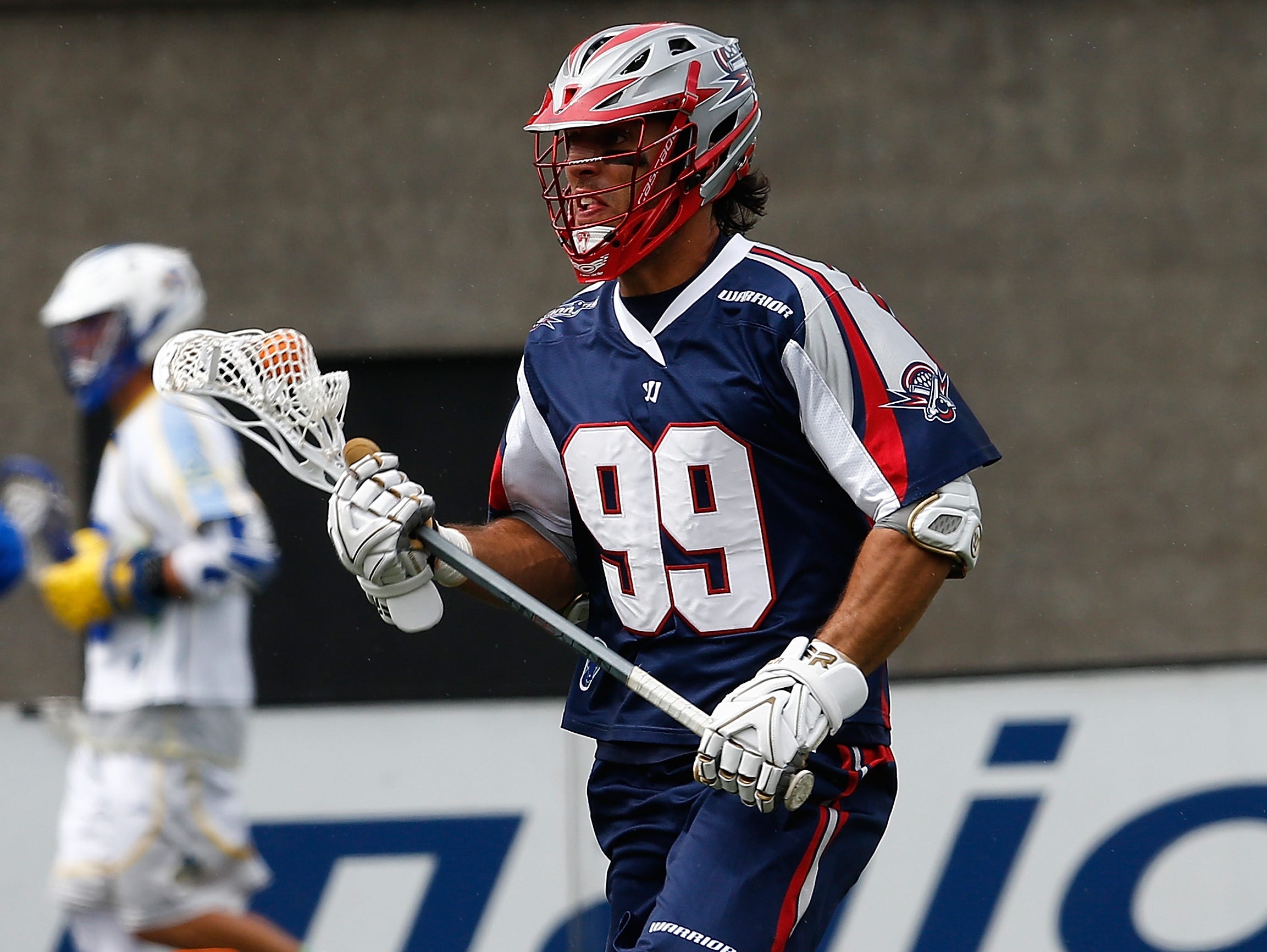DeMatha alum Paul Rabil chucks lax ball across Inner Harbor | USA TODAY