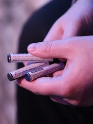 Andrew Greenspan holds some of the liquid medical marijuana