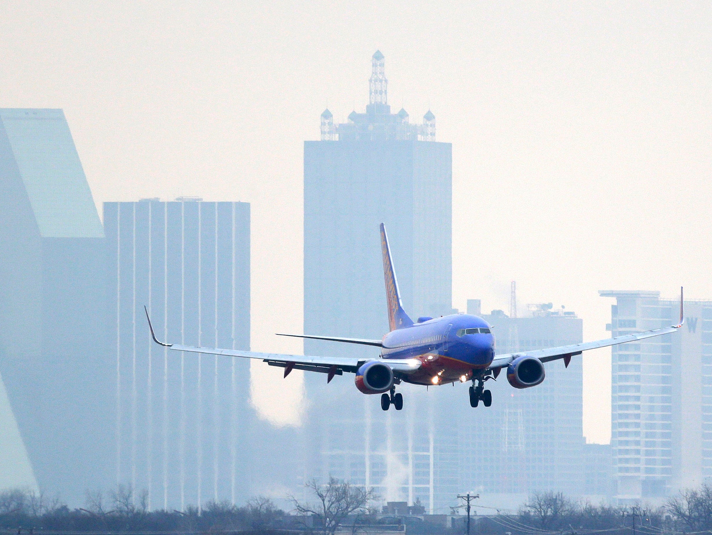 A Southwest Airlines jet lands at Love Field in Dallas on Feb. 3, 2014.