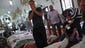 People mourn over the bodies of their relatives in the El-Iman Mosque in Nasr City.