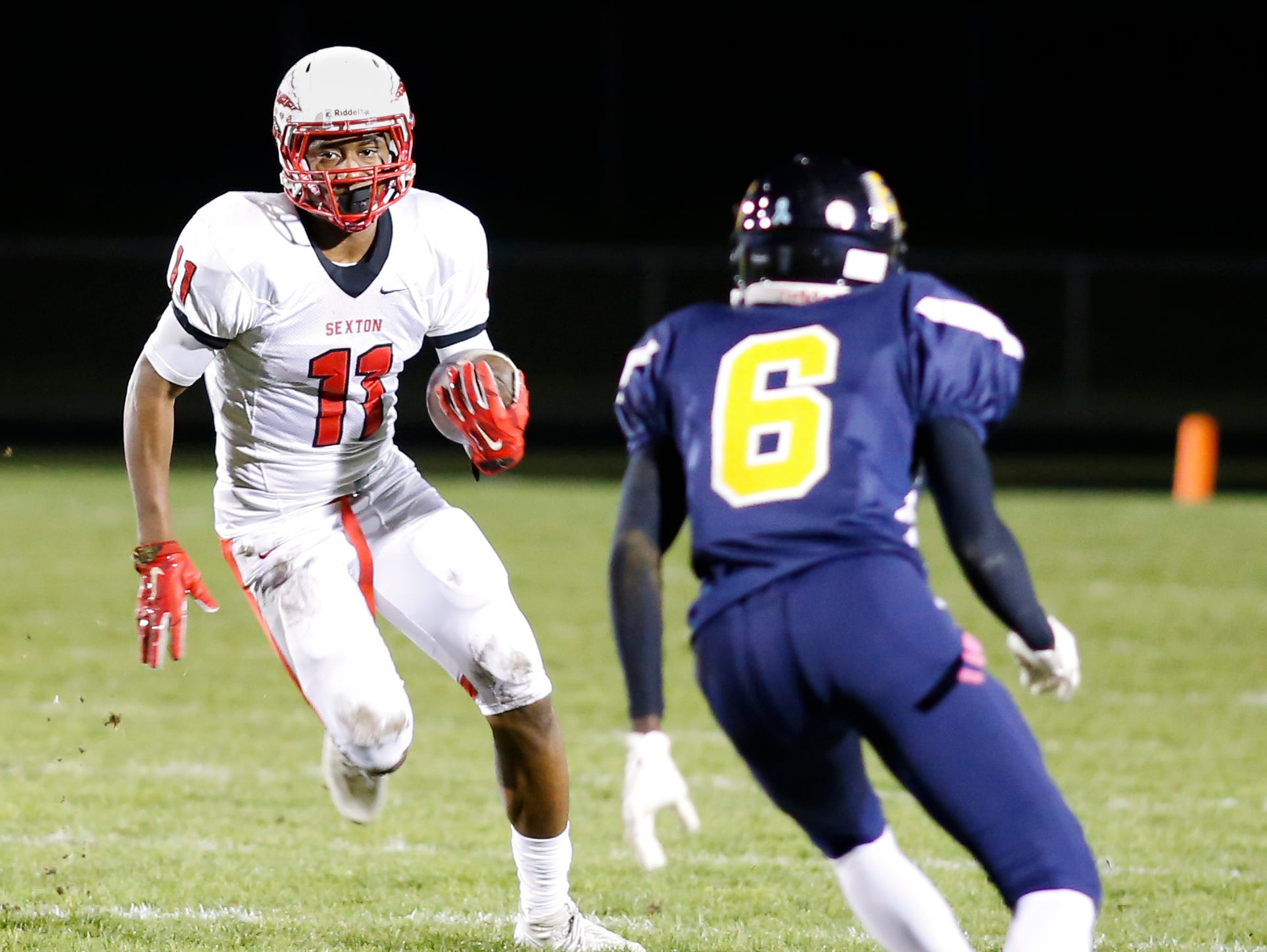 Sexton's Karl Brooks gains yardage against Eastern Friday, October 21, 2016 at Sexton.