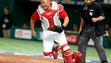 March 9: China's catcher Wang Wei chases a wild pitch.