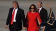 President Trump walks with first lady Melania Trump