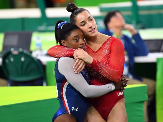 USA gymnasts Simone Biles (left) and Aly Raisman finished