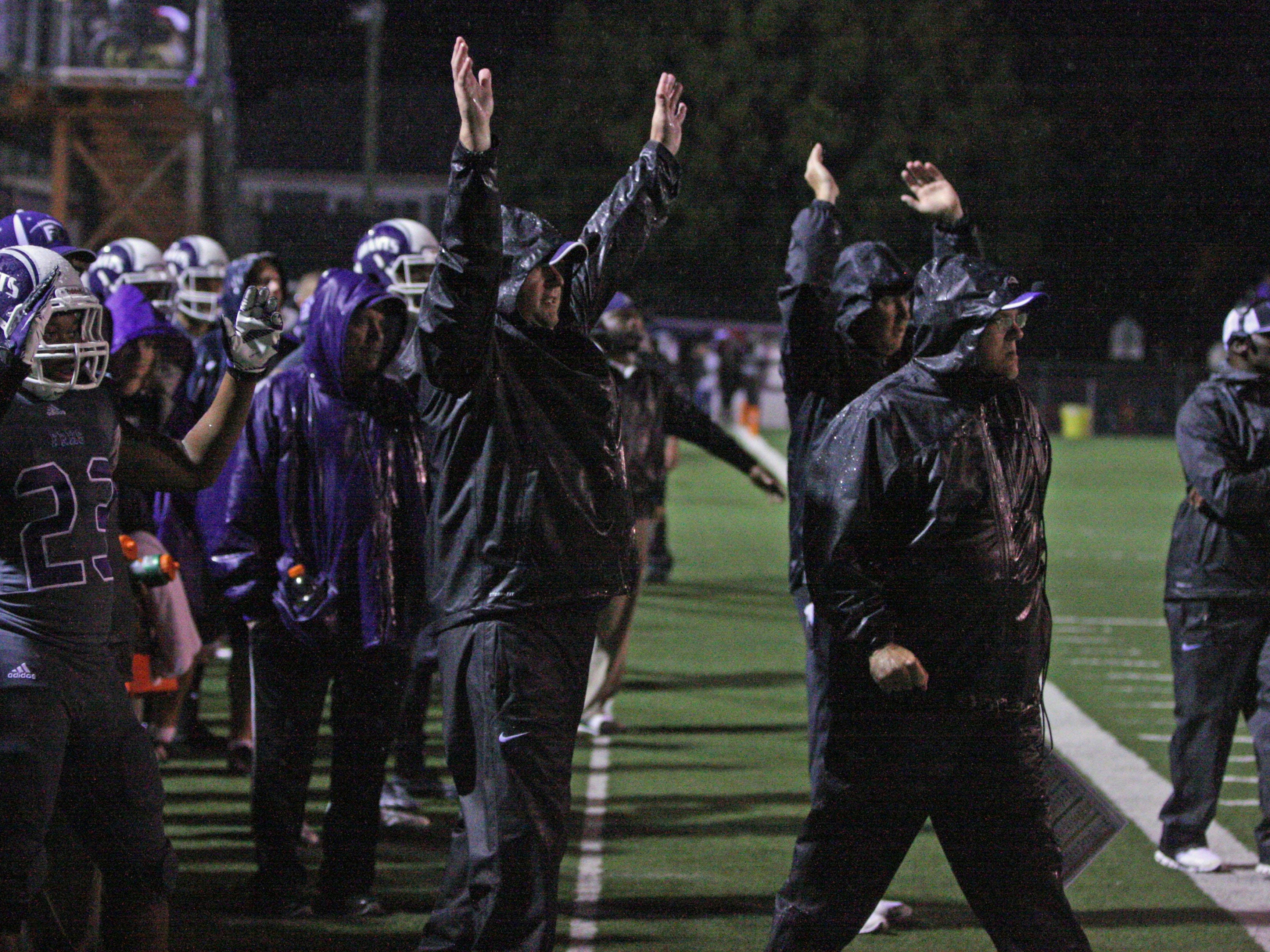 Ross' siideline reacts to a 4th quarter touchdown against Sandusky.