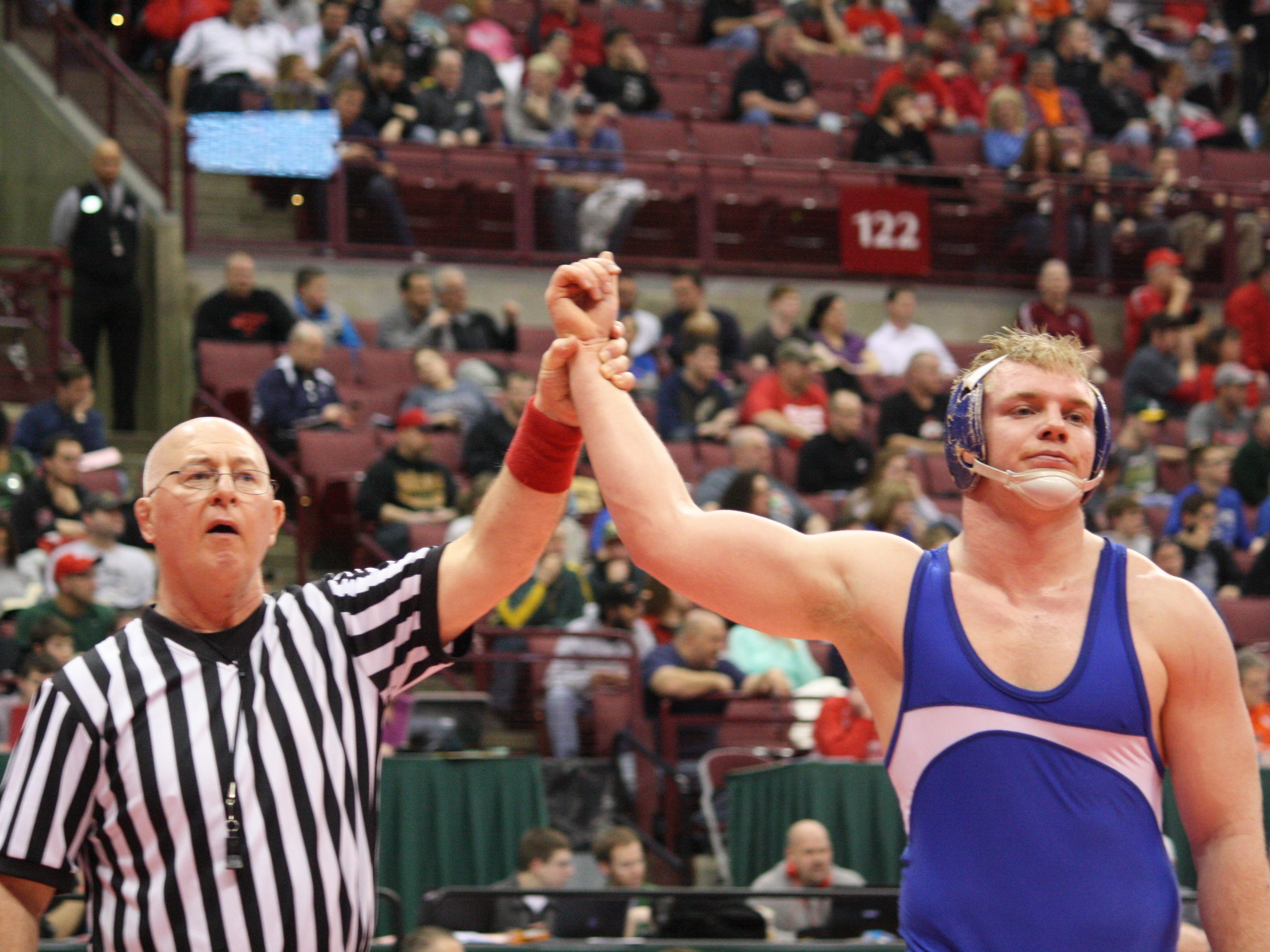 St. Xavier senior Cole Jones won his Division I semifinal at 220 pounds to make it to the state final March 13 in Columbus. On March 14, Jones won the state title 3-1 in overtime.