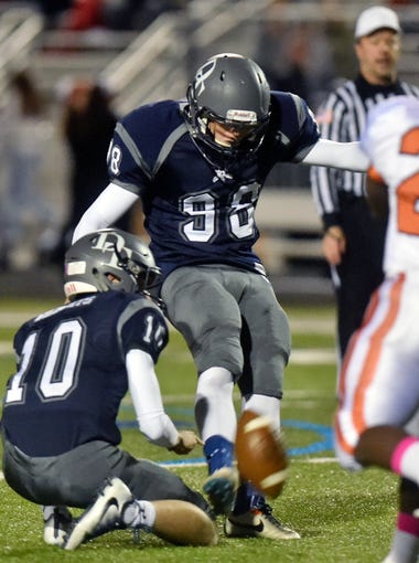 Dallastown's Drake Pew kicks the ball for a 47-yard