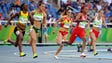 Michelle-Lee Ayhe of Trinidad and Tobago  leads during