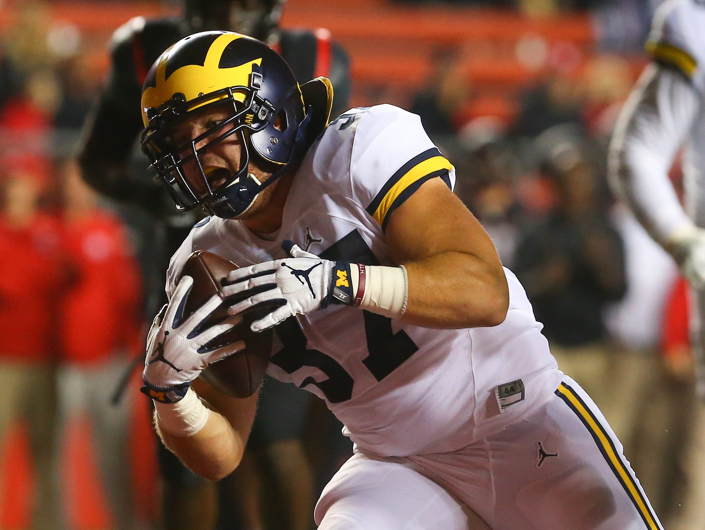 Michigan Wolverines fullback Bobby Henderson, a John Jay High School graduate, runs for a touchdown against the Rutgers Scarlet Knights at High Points Solutions Stadium on Oct. 8 in Piscataway, New Jersey.