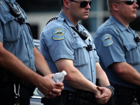 [Image: 1409549598000-AP-Police-Shooting-Missouri-Rally.jpg]