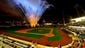 Fireworks explode from the baseball field for a sold-out