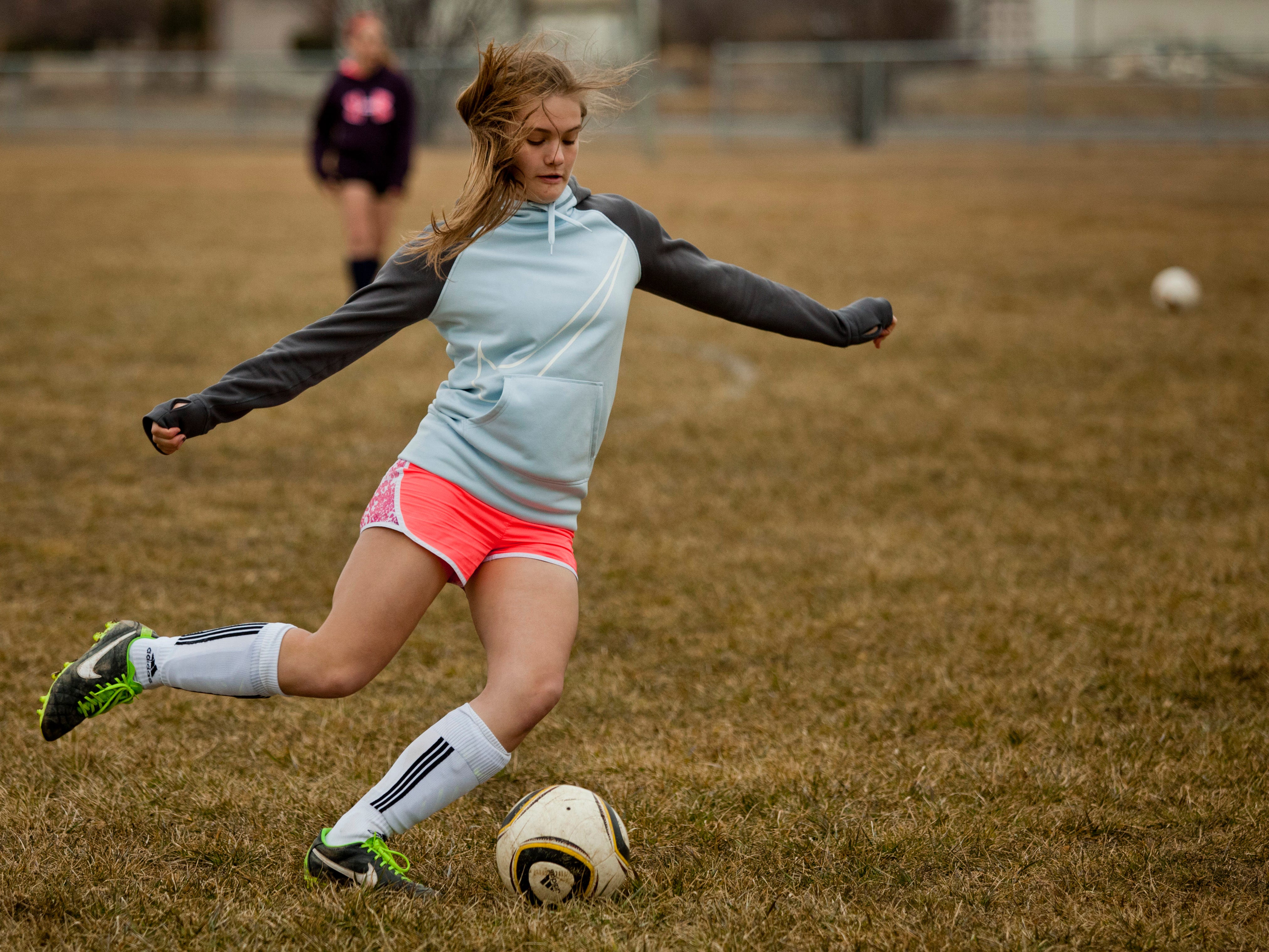 Freshman Riley Druia passes the ball during practice Thursday at Brockway Township Park.
