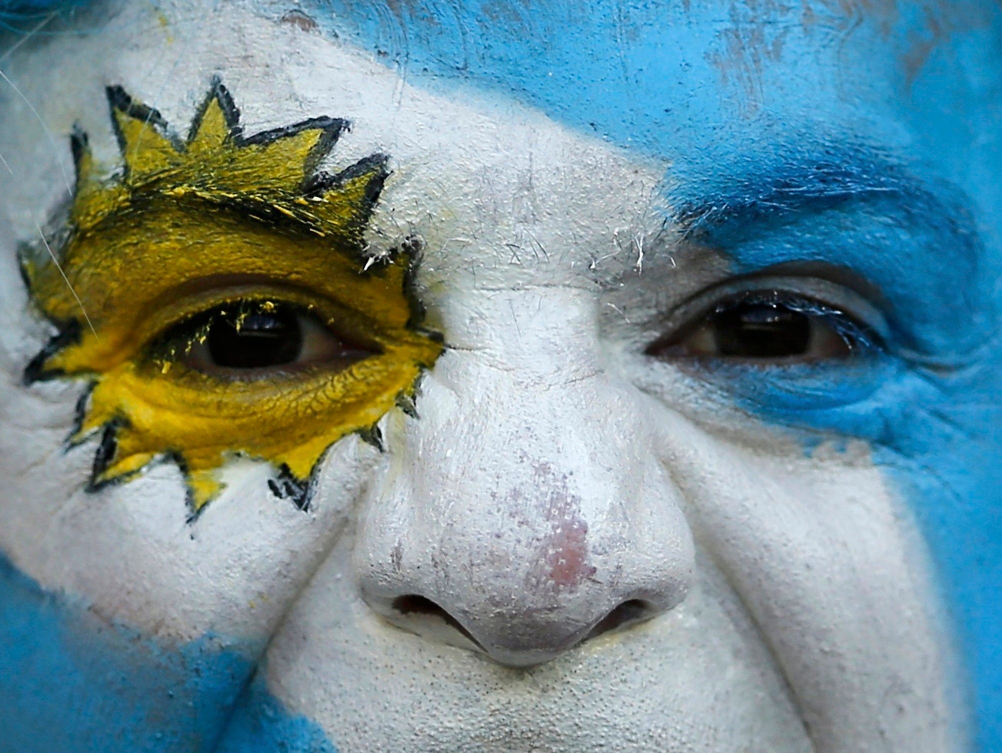 An Argentina fan waits for the 2014 World Cup Group F soccer match between Argentina and Iran at the the Mineirao stadium in Belo Horizonte on June 21, 2014.