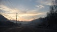 A view down Highway 321 after wildfires mixed with