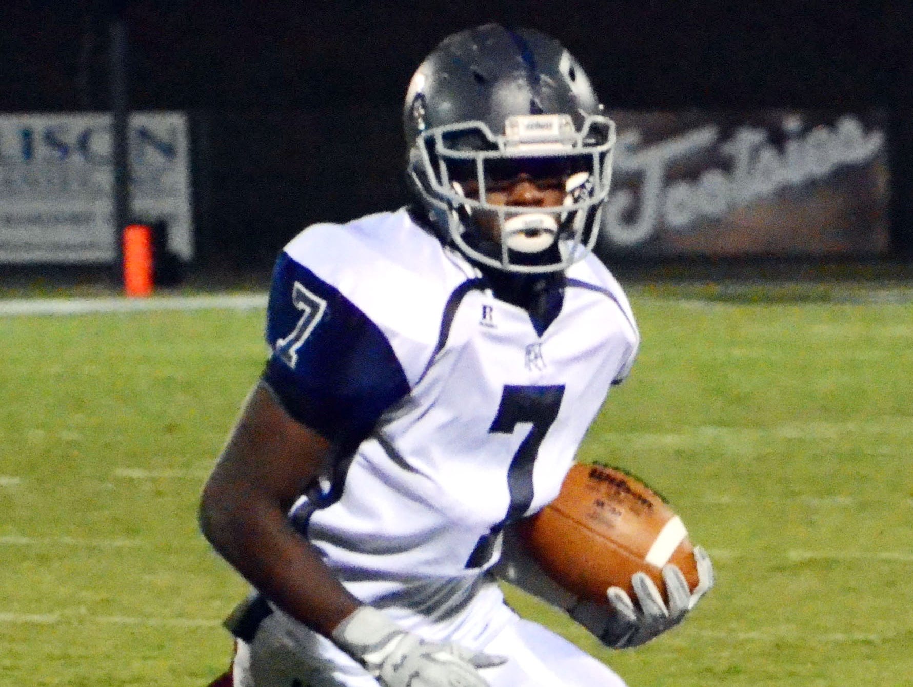 Franklin Road Academy's Larry Wilhoite heads up field after hauling in a first-half reception against Davidson Academy.