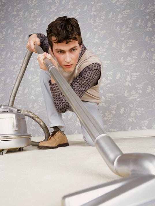 Man with vacuum