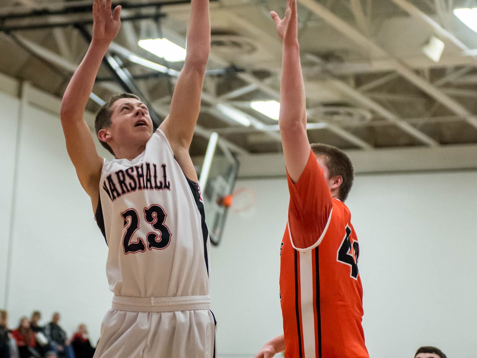 Marshall's Cam Face (23) takes his shot against Chatlotte in Tuesday evening's game.