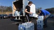 Volunteers unload water at the Rocky Top Sports World