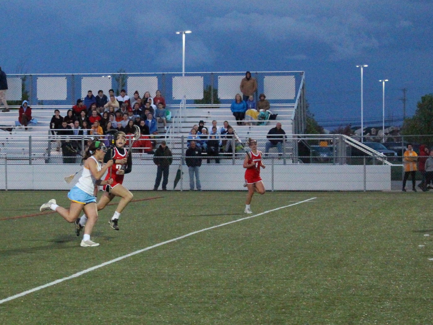 Cape freshman midfielder Katie Frederick runs the ball up field.