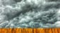 Southern storm: Sinister clouds roll above a fence