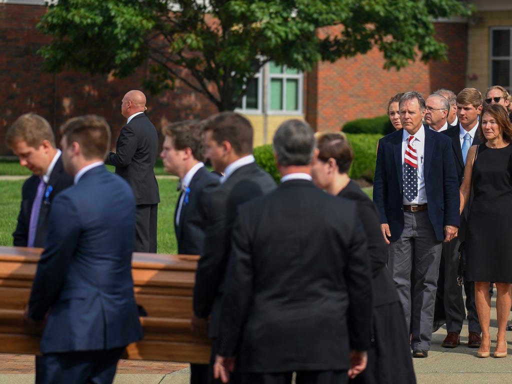 Fred and Cindy Warmbier watch as their son, Otto, is placed in a hearse after his funeral in Wyoming, Ohio. Otto Warmbier, a 22-year-old University of Virginia student who was sentenced in March 2016 to 15 years in prison with hard labor in North Kor