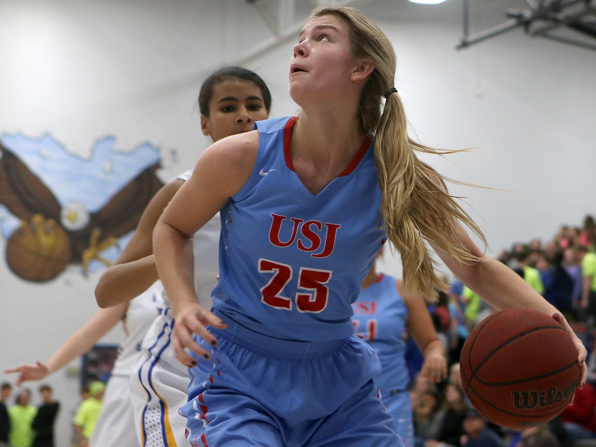 University School of Jackson's Anna Jones (25) eyes the basket against Jackson Christian at Jackson Christian, on Tuesday, Dec. 8, 2015.