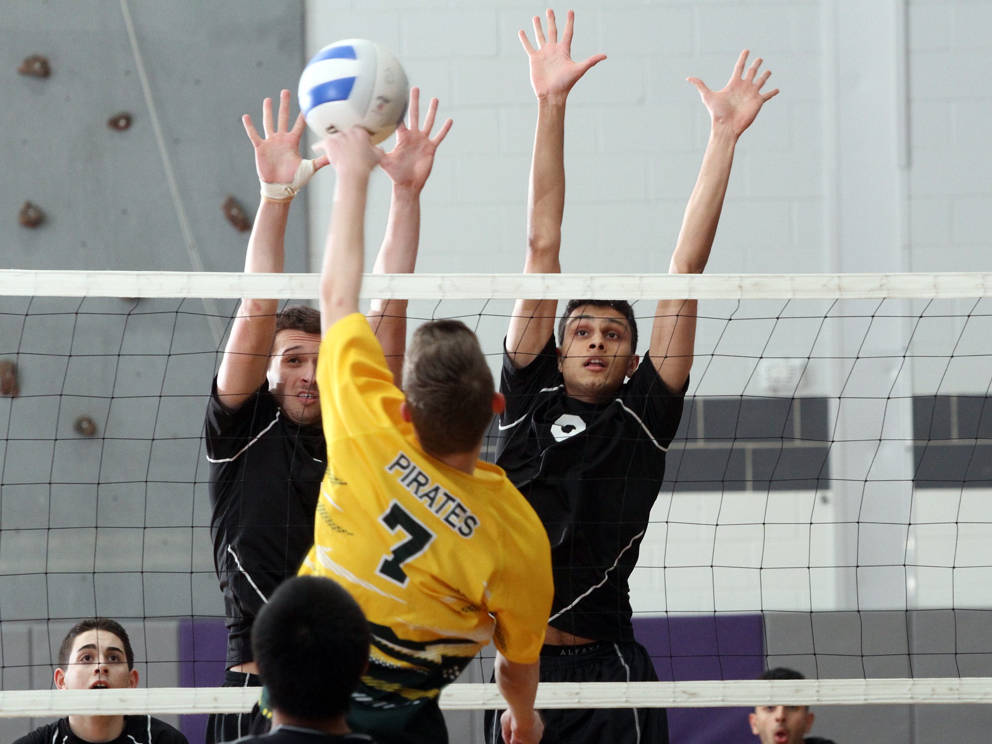 Robert Meyer (left) and Dhruv Patel of Old Bridge look to block a shot by West Windsor-Plainsboro's Jon Asay, Tuesday, April 21, 2015, in Old Bridge, NJ.