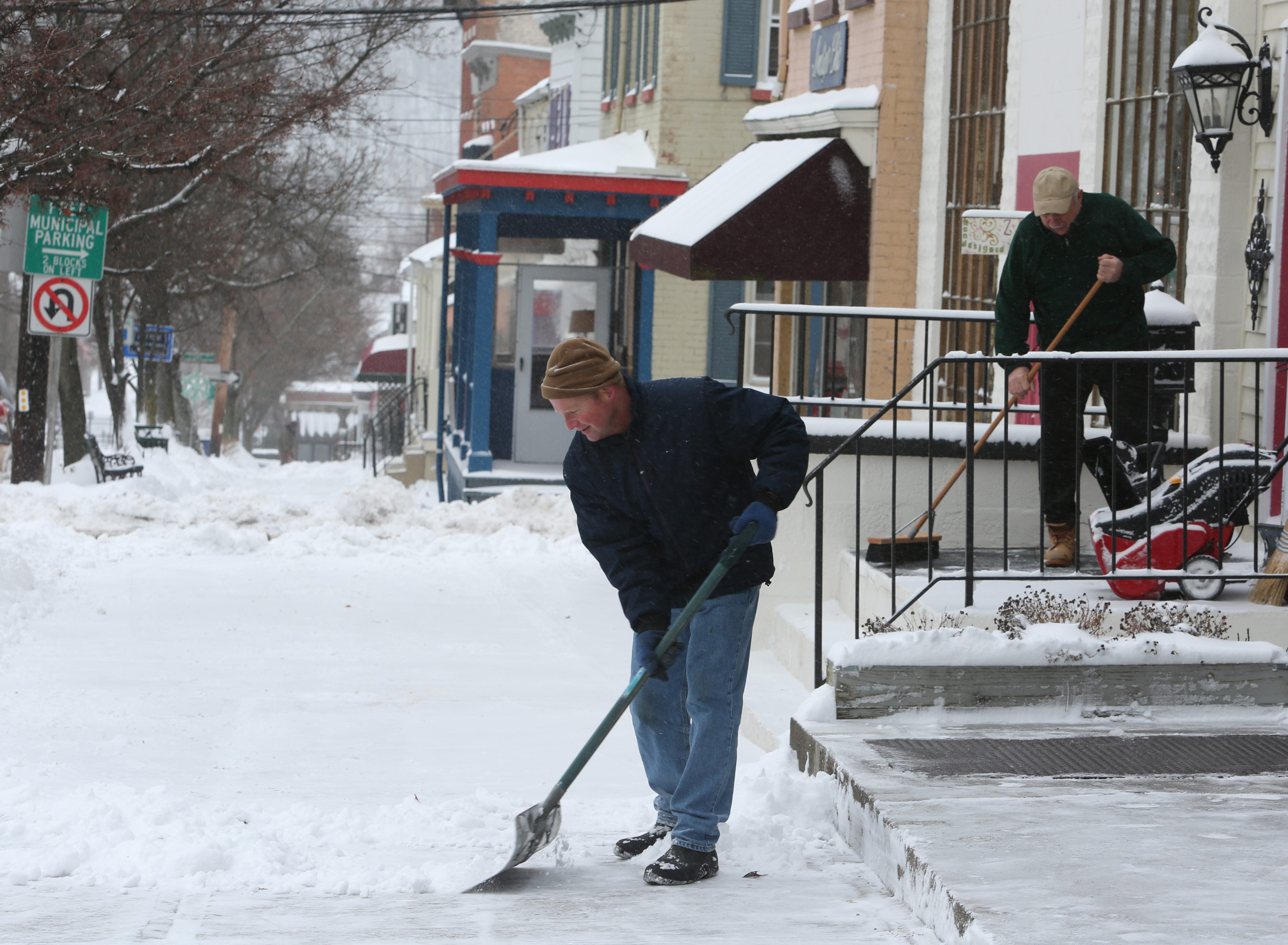 Blizzard fizzles: Gusting winds, frigid temperatures linger