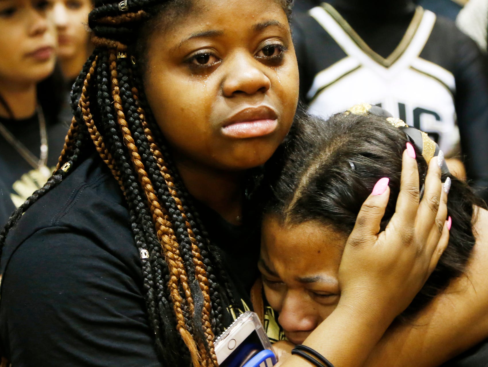 Darea Warner, left, and Victoria Burgess cry after Griffith lost to Marion 60-58 in the Class 3A basketball semistate Wednesday, March 23, 2016, Lafayette Jefferson High School.