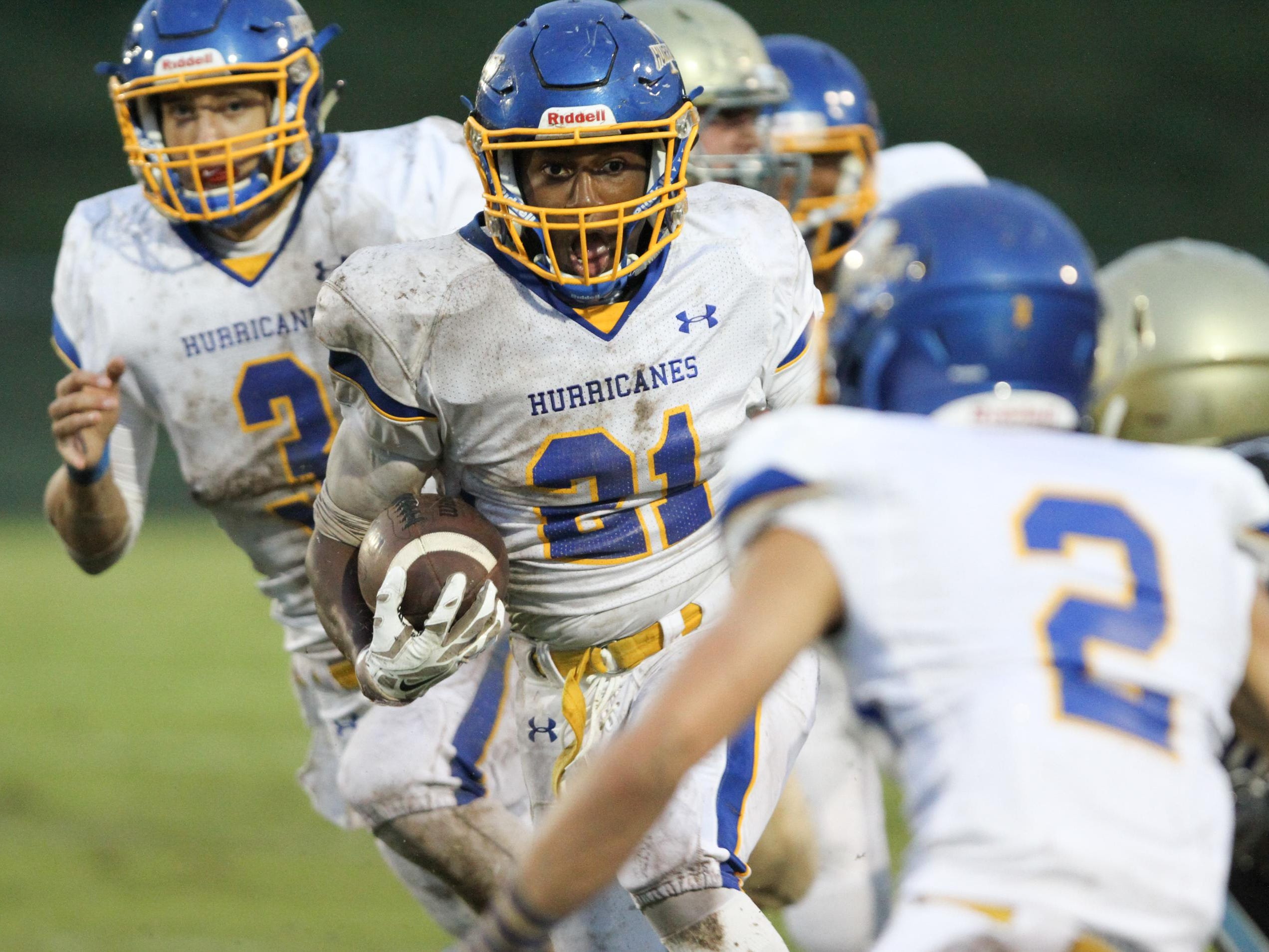 Wren running back Nathaniel Ekwere (21) rushes upfield against Daniel friday night, October 2, 2015.