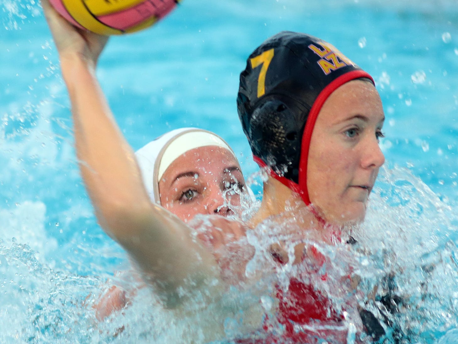 Palm Desert's Elise Stein (black cap) plays during a CIF playoff game against the Citrus Valley Blackhawks (white caps) on Wednesday, February 18, 2015. Palm Desert won 14-4.
