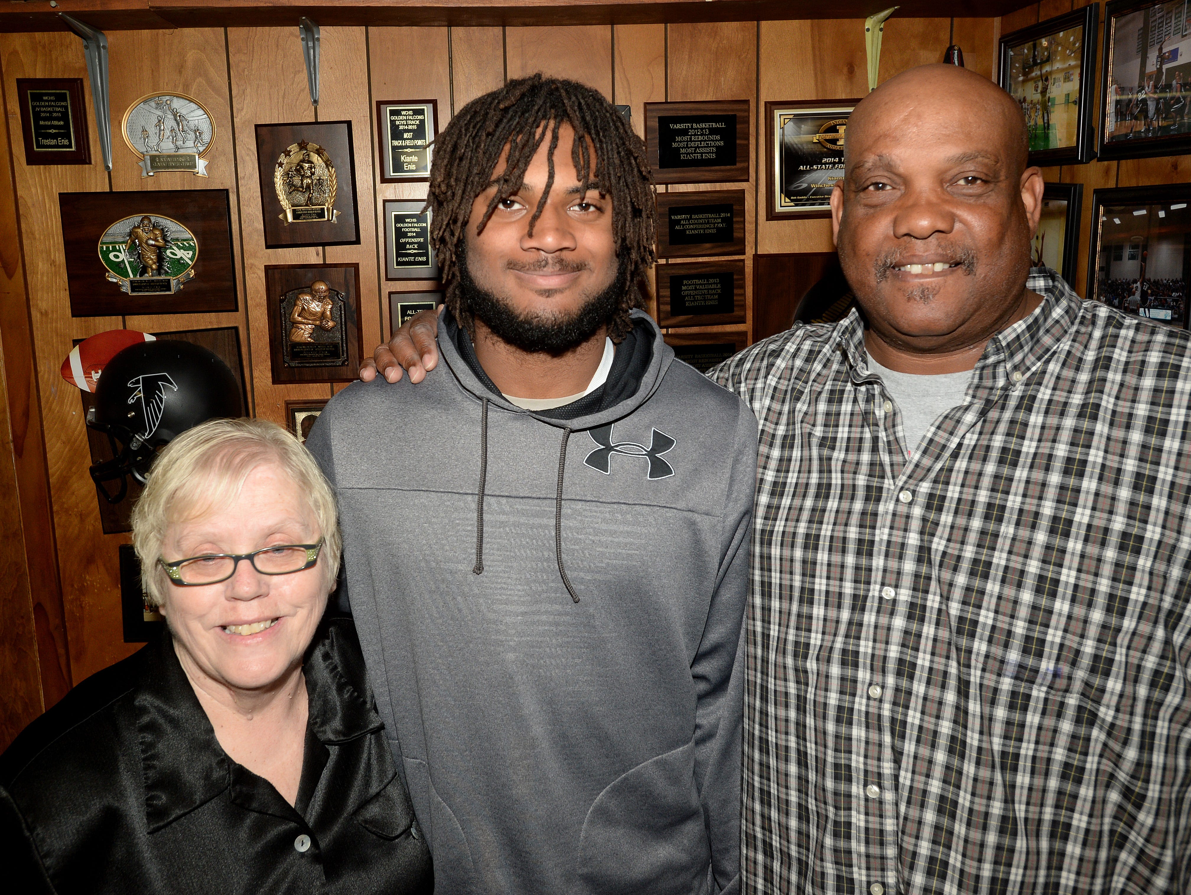 Kiante Enis with grandmother Judy Enis, left, and grandfather Dwight, Saturday, April 30, 2016, at their home in Saratoga, Ind.