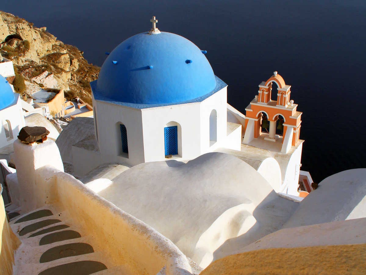 A visit to the Greek isle of Santorini should be less expensive this year, due to the nation's economic crisis.