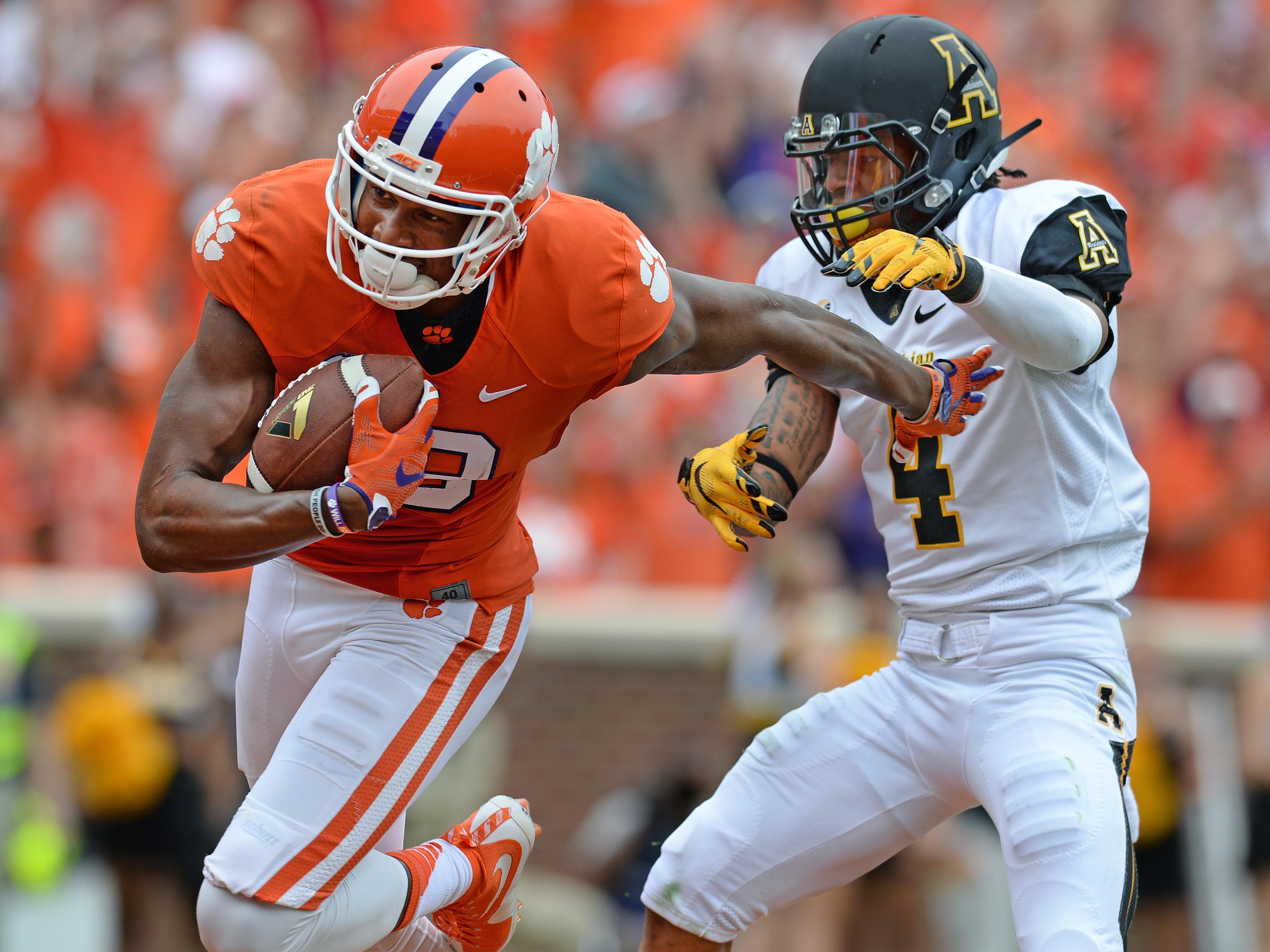 Clemson wide receiver Charone Peake (19) catches a TD past Appalachian State defensive back Mondo Williams (4) during the 2nd quarter Saturday, September 12, 2015 at Clemson's Memorial Stadium.