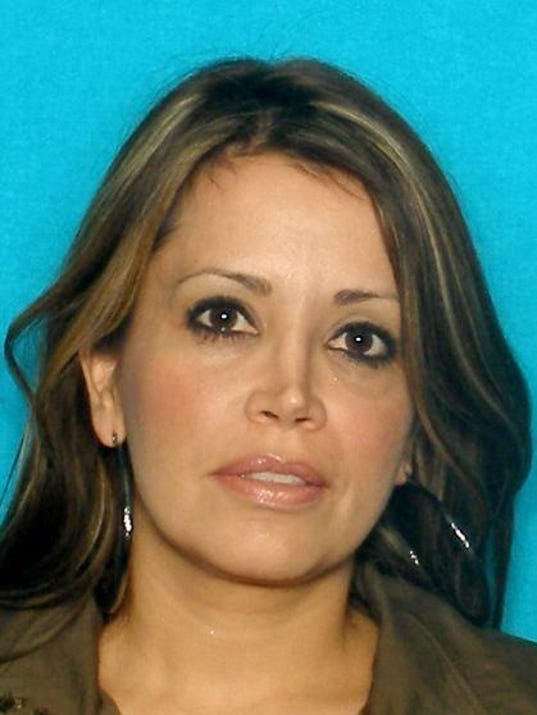 Ex-teacher sought in racketeering case