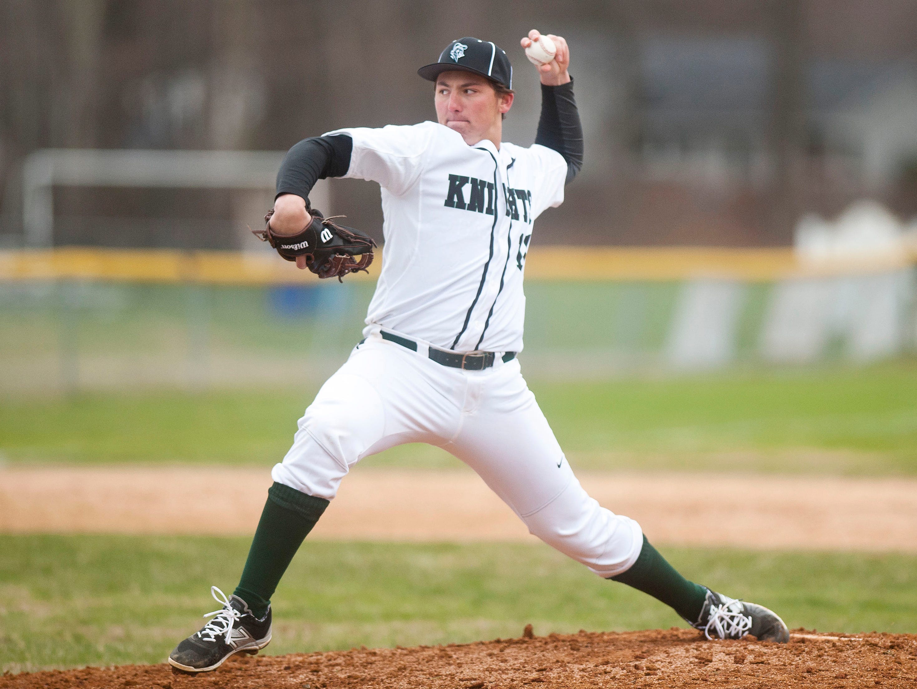 Rice pitcher Will Hesslink fires to the plate in the fourth inning of Friday's baseball game against Essex in South Burlington.