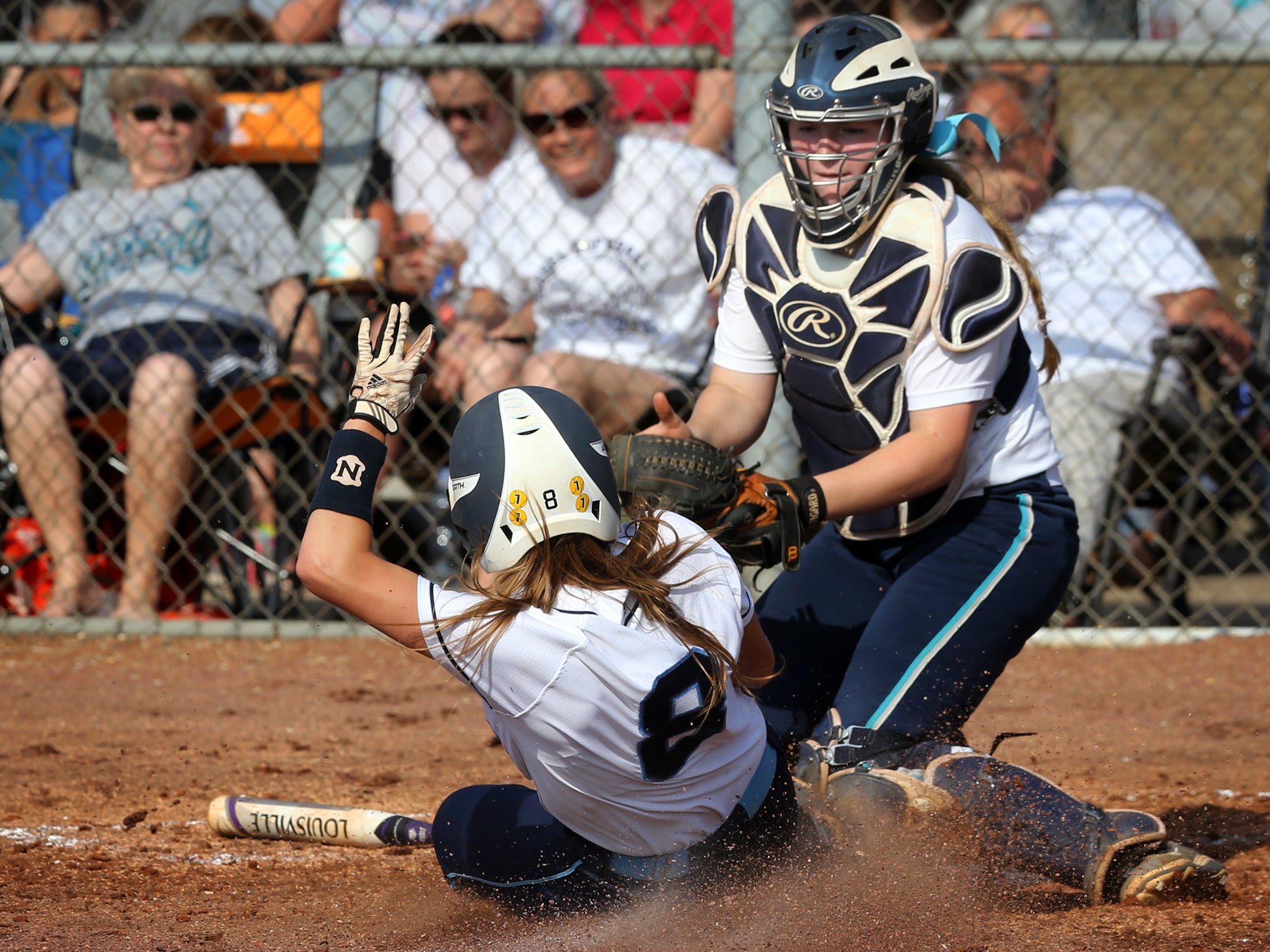 Siegel’s Kara Lynee Levi tags out harding Valley Academy’s Leslie Beecham at home in the fourth inning Tuesday during the first round of the Class AAA Softball Tournament.